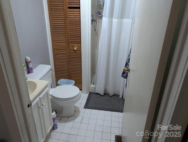 2261 Felly Ln, Lancaster, SC 29720 - full bathroom featuring a shower stall, vanity, tile patterned flooring, and a closet