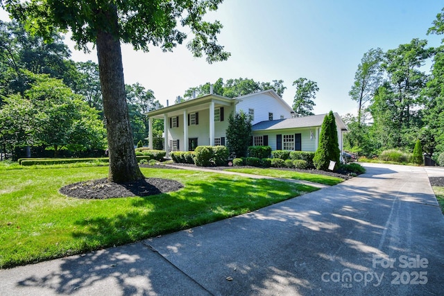 711 Yadkin St, Albemarle, NC 28001 - greek revival house with a front yard