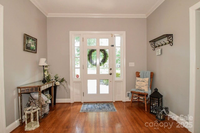 711 Yadkin St, Albemarle, NC 28001 - foyer with crown molding and wood finished floors
