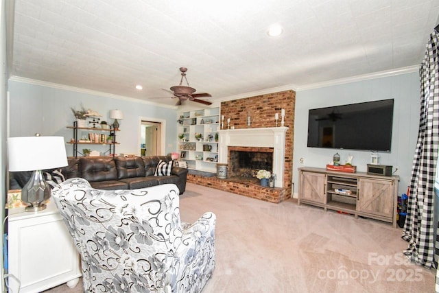 711 Yadkin St, Albemarle, NC 28001 - living room with carpet, ceiling fan, a fireplace, ornamental molding, and recessed lighting