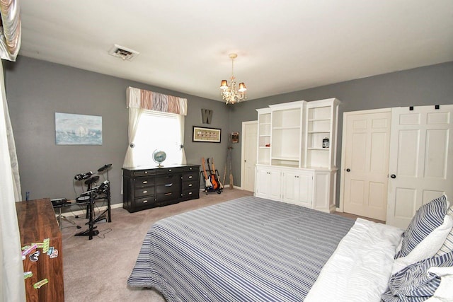 711 Yadkin St, Albemarle, NC 28001 - bedroom with a chandelier, light colored carpet, and a closet