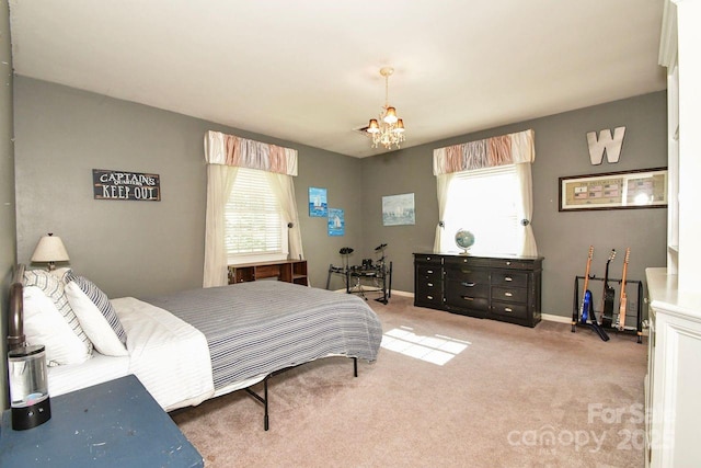 711 Yadkin St, Albemarle, NC 28001 - bedroom featuring a chandelier and light colored carpet