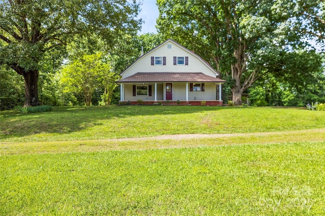 2028 Old Latter Rd, Newton, NC 28658 - view of front of home featuring a porch, a front yard, a metal roof, and view of scattered trees