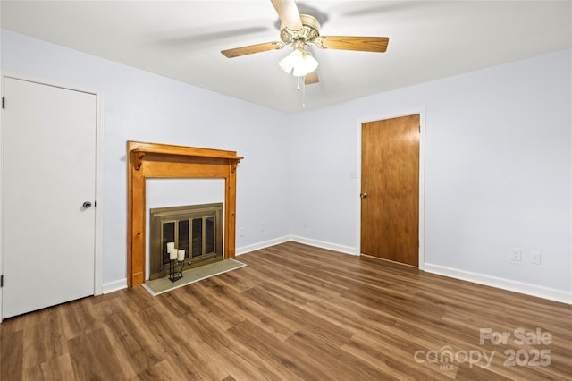 2028 Old Latter Rd, Newton, NC 28658 - unfurnished living room with wood finished floors, a glass covered fireplace, and ceiling fan