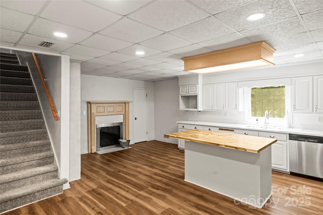 2028 Old Latter Rd, Newton, NC 28658 - kitchen with dishwasher, butcher block counters, dark wood finished floors, white cabinetry, and recessed lighting