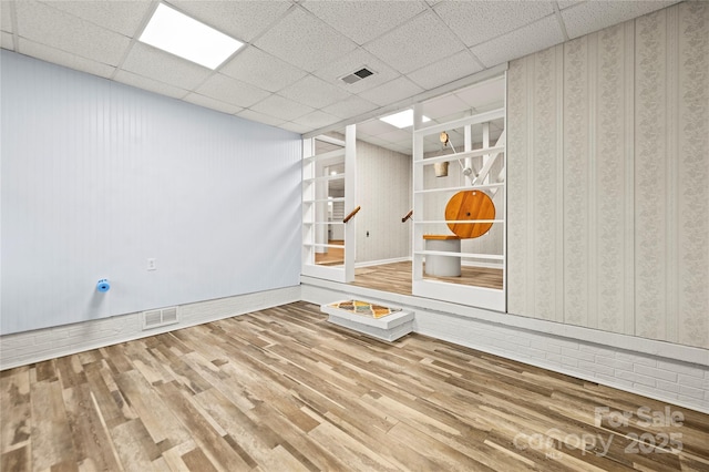 2028 Old Latter Rd, Newton, NC 28658 - unfurnished room with wood finished floors and a paneled ceiling