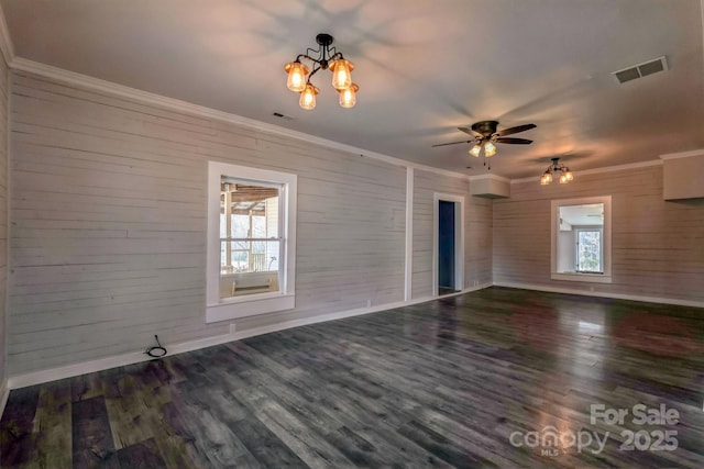 3607 Austin Rd, Monroe, NC 28112 - unfurnished living room with a chandelier, ornamental molding, dark wood-type flooring, and a ceiling fan