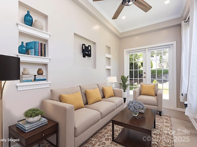 621 Pine Links Dr, Tega Cay, SC 29708 - living area with ornamental molding, built in features, french doors, ceiling fan, and recessed lighting