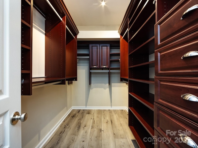 621 Pine Links Dr, Tega Cay, SC 29708 - spacious closet featuring light wood-style floors