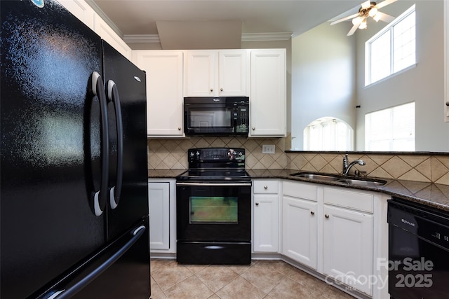 621 Pine Links Dr, Tega Cay, SC 29708 - kitchen featuring black appliances, white cabinetry, backsplash, ornamental molding, and dark stone counters