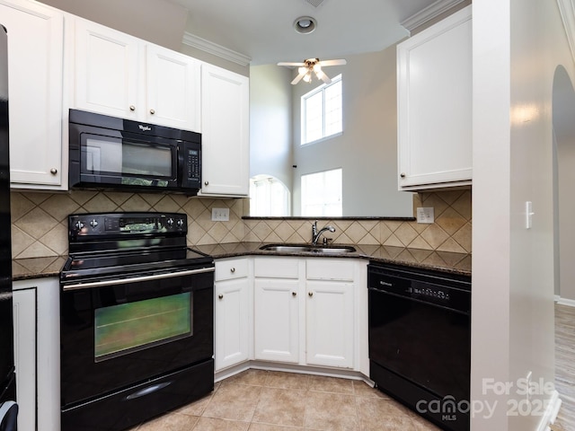 621 Pine Links Dr, Tega Cay, SC 29708 - kitchen featuring black appliances, white cabinets, ceiling fan, decorative backsplash, and light tile patterned floors