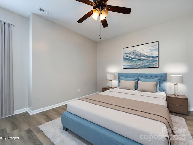 621 Pine Links Dr, Tega Cay, SC 29708 - bedroom featuring wood finished floors and a ceiling fan