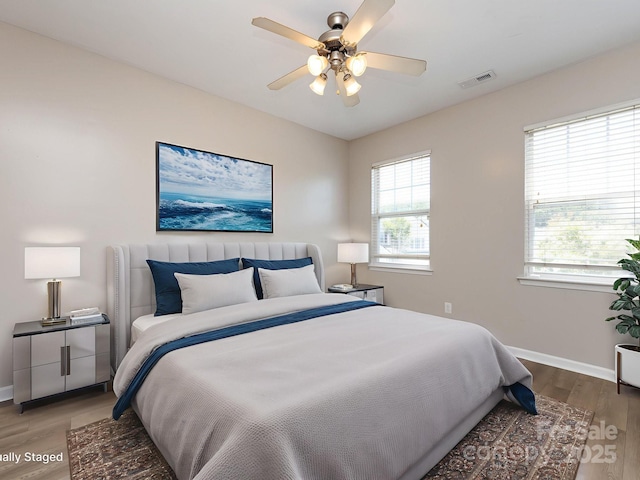 621 Pine Links Dr, Tega Cay, SC 29708 - bedroom featuring wood finished floors and ceiling fan