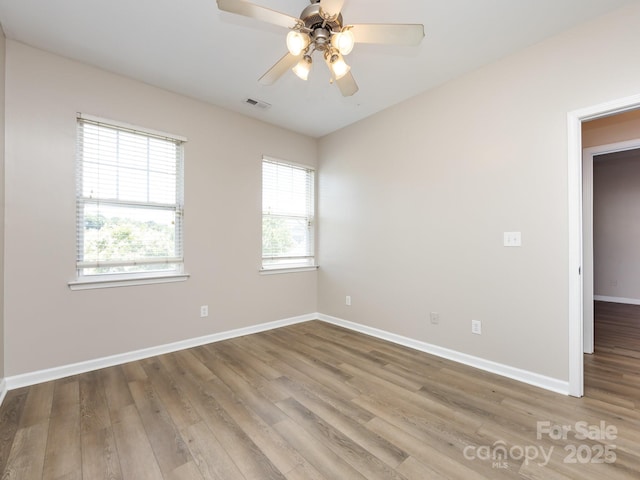 621 Pine Links Dr, Tega Cay, SC 29708 - unfurnished room featuring wood finished floors and a ceiling fan