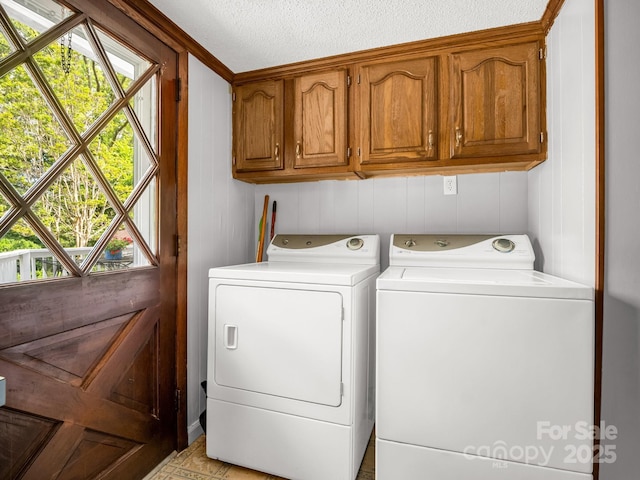 1111 Bills Creek Rd, Lake Lure, NC 28746 - laundry area with cabinet space, independent washer and dryer, and a textured ceiling