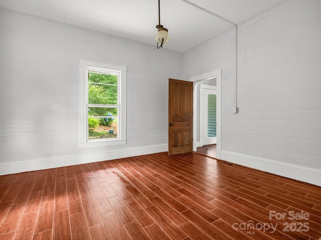 1111 Bills Creek Rd, Lake Lure, NC 28746 - unfurnished room with dark wood-type flooring and baseboards