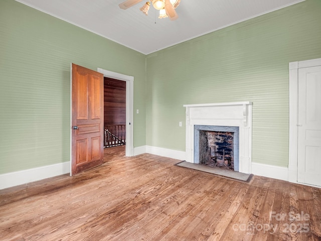 1111 Bills Creek Rd, Lake Lure, NC 28746 - unfurnished living room with wood finished floors, a ceiling fan, and a premium fireplace