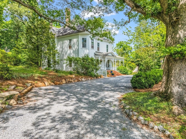 1111 Bills Creek Rd, Lake Lure, NC 28746 - view of front facade with a porch and driveway