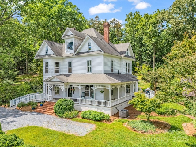1111 Bills Creek Rd, Lake Lure, NC 28746 - victorian home with a porch, a chimney, and a front yard