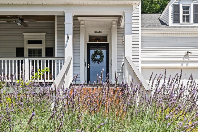 3535 Selwyn Farms Ln, Charlotte, NC 28209 - entrance to property featuring ceiling fan and roof with shingles
