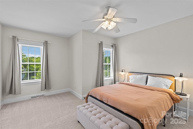 3535 Selwyn Farms Ln, Charlotte, NC 28209 - bedroom with multiple windows, carpet flooring, and ceiling fan