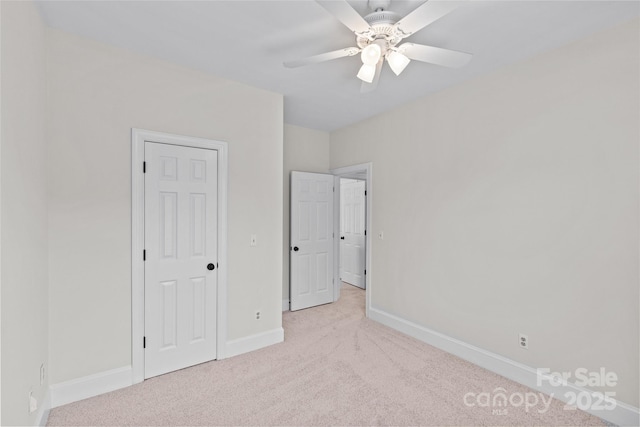 3535 Selwyn Farms Ln, Charlotte, NC 28209 - unfurnished bedroom featuring carpet floors and a ceiling fan