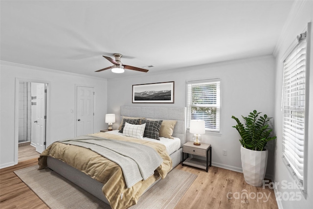 11401 Lone Star Cir, Charlotte, NC 28226 - bedroom with crown molding, light wood-style floors, a ceiling fan, and connected bathroom