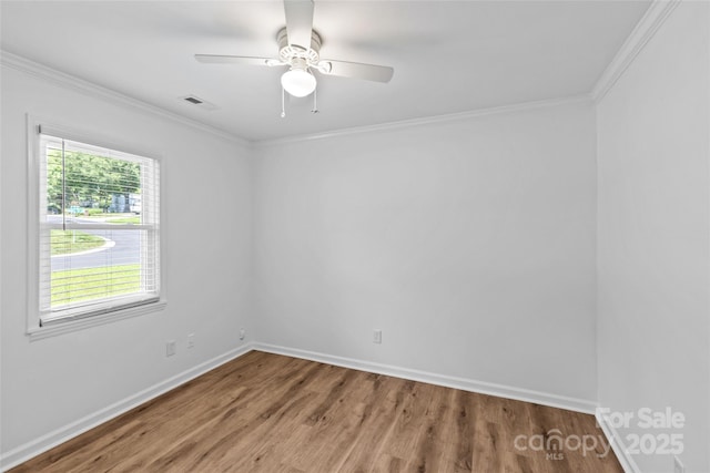 11401 Lone Star Cir, Charlotte, NC 28226 - unfurnished room featuring wood finished floors, ornamental molding, and a ceiling fan