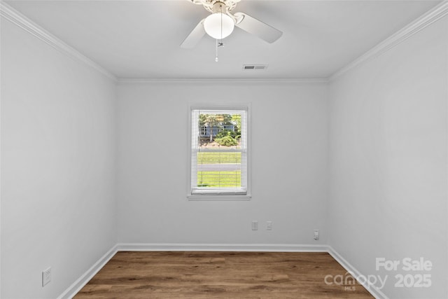 11401 Lone Star Cir, Charlotte, NC 28226 - spare room featuring wood finished floors, a ceiling fan, and crown molding