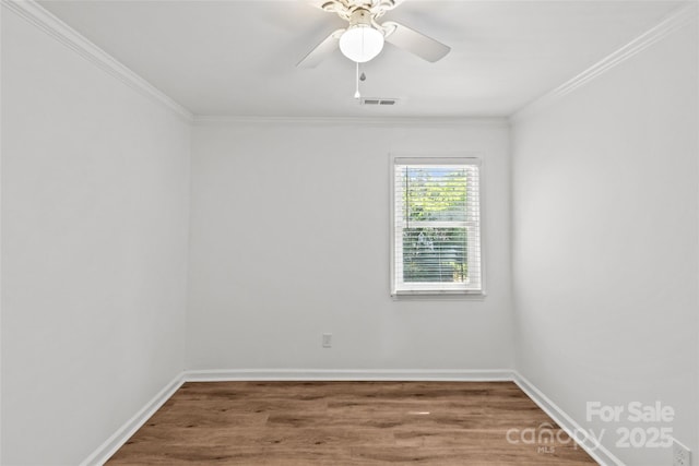 11401 Lone Star Cir, Charlotte, NC 28226 - unfurnished room with crown molding, a ceiling fan, and wood finished floors
