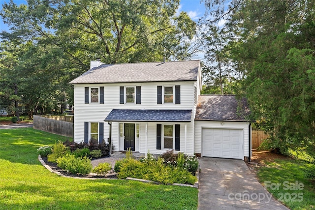 11401 Lone Star Cir, Charlotte, NC 28226 - traditional-style house with a garage, a chimney, concrete driveway, covered porch, and a shingled roof