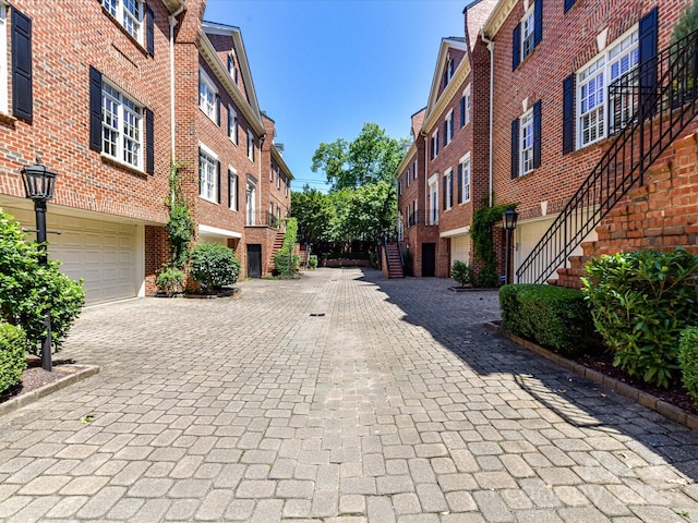 344 S Laurel Ave, Charlotte, NC 28207 - view of decorative alley featuring stairway and street lighting
