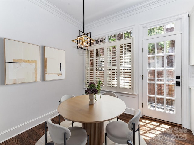 344 S Laurel Ave, Charlotte, NC 28207 - dining area with wood finished floors, a chandelier, and crown molding