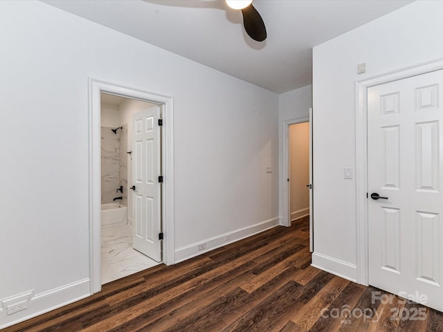 344 S Laurel Ave, Charlotte, NC 28207 - unfurnished bedroom featuring ensuite bathroom, dark wood-style floors, and a ceiling fan