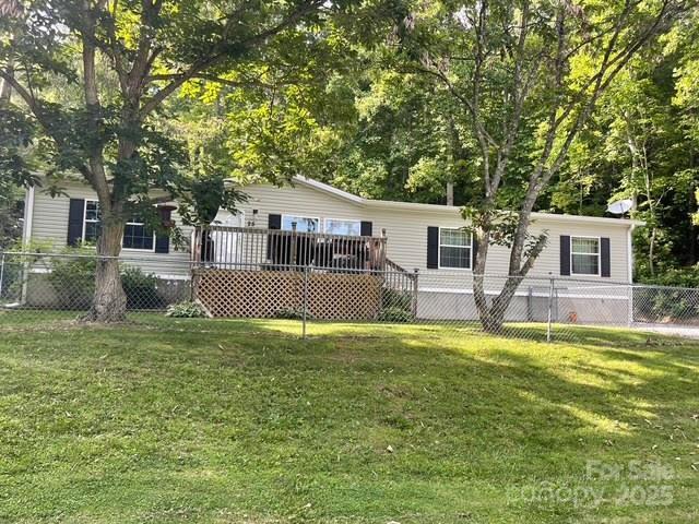 25 Mountain View Rdg, Fairview, NC 28730 - rear view of house with a wooden deck