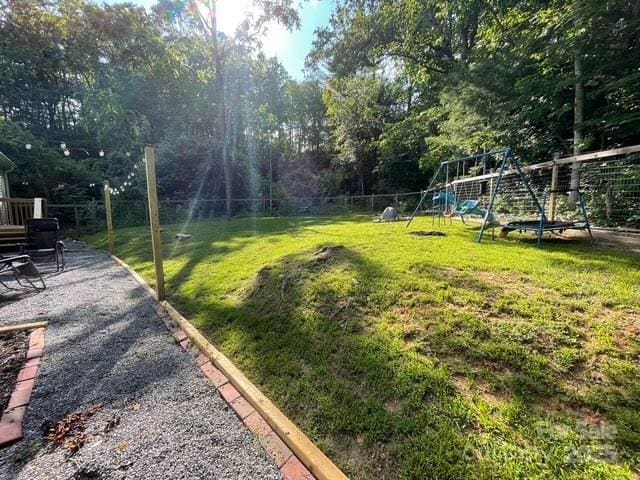 25 Mountain View Rdg, Fairview, NC 28730 - fenced backyard with a patio