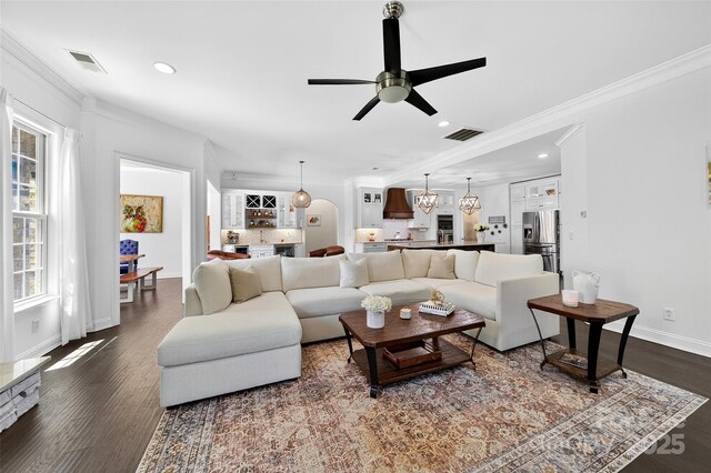 3981 Spinnaker Pl, Denver, NC 28037 - living room featuring ornamental molding, a ceiling fan, recessed lighting, and dark wood-type flooring