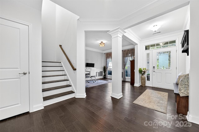 3981 Spinnaker Pl, Denver, NC 28037 - foyer featuring decorative columns, plenty of natural light, wood finished floors, and ornamental molding