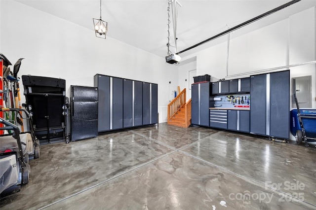 3981 Spinnaker Pl, Denver, NC 28037 - garage featuring a garage door opener