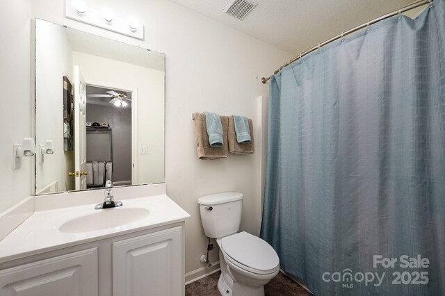 7518 Silver Arrow Dr, Charlotte, NC 28273 - bathroom featuring ceiling fan, vanity, and curtained shower