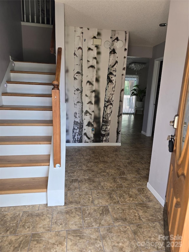 3 Hidden Sands Ct, Columbia, SC 29229 - stairs with a textured ceiling and stone finish flooring