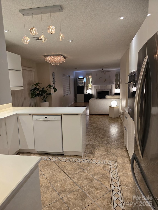 3 Hidden Sands Ct, Columbia, SC 29229 - kitchen featuring white dishwasher, stainless steel fridge with ice dispenser, white cabinetry, oven, and a textured ceiling