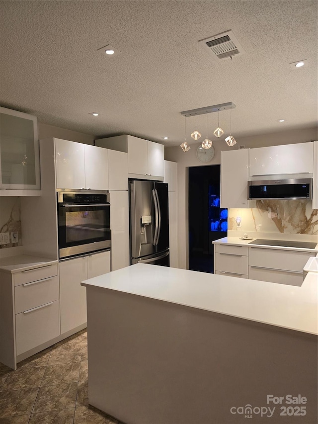 3 Hidden Sands Ct, Columbia, SC 29229 - kitchen with stainless steel appliances, ventilation hood, modern cabinets, white cabinets, and a textured ceiling