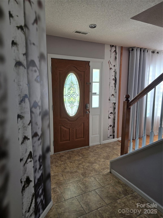 3 Hidden Sands Ct, Columbia, SC 29229 - entryway featuring a textured ceiling