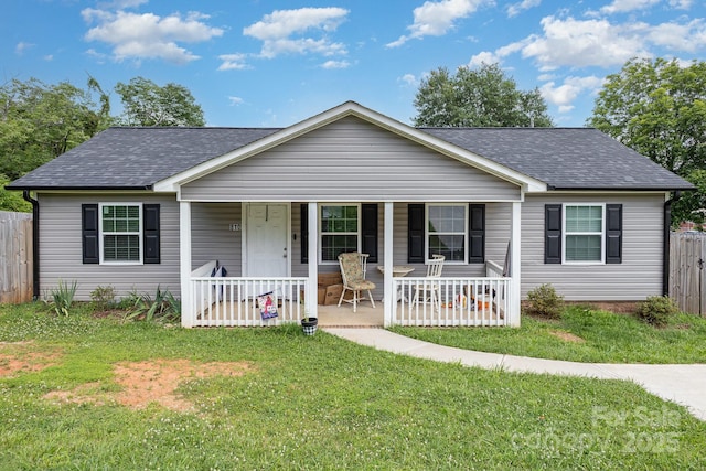 810 4th St, Kings Mountain, NC 28086 - view of front of house featuring a shingled roof and covered porch