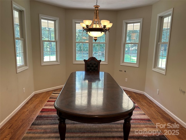 207 Wagon Ln, Rutherfordton, NC 28139 - dining space featuring a chandelier and dark wood finished floors