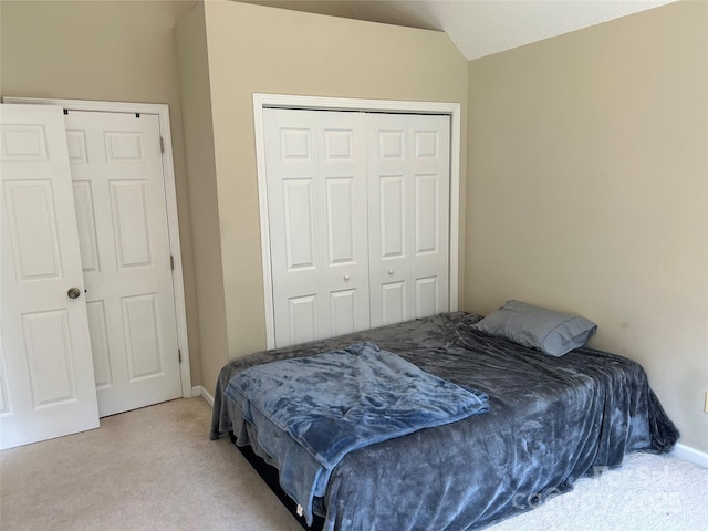 207 Wagon Ln, Rutherfordton, NC 28139 - bedroom featuring carpet flooring, vaulted ceiling, and a closet