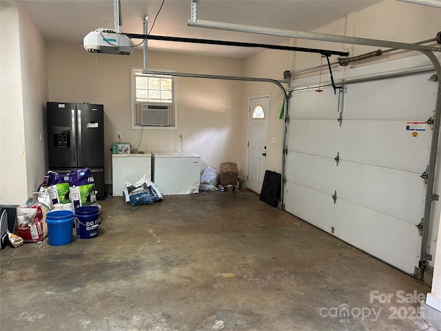 207 Wagon Ln, Rutherfordton, NC 28139 - garage featuring stainless steel refrigerator with ice dispenser, a garage door opener, and cooling unit