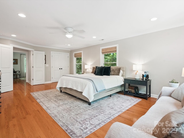 1711 Apple Tree Ln Unit 28, Fort Mill, SC 29715 - bedroom featuring crown molding, recessed lighting, light wood-type flooring, a ceiling fan, and a closet