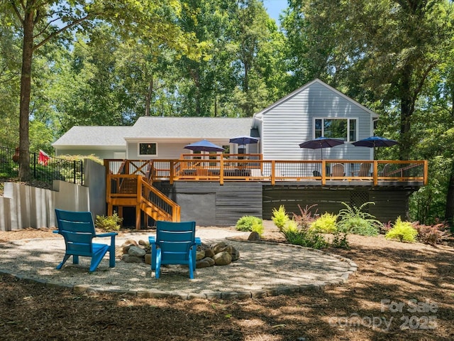 1711 Apple Tree Ln Unit 28, Fort Mill, SC 29715 - rear view of house with a wooden deck, stairway, an outdoor fire pit, and a patio area